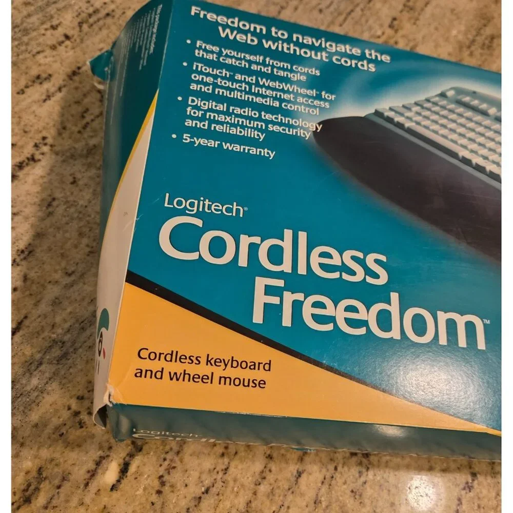 Logitech Cordless Freedom Navigator Keyboard Wheel Mouse Receiver User Guide